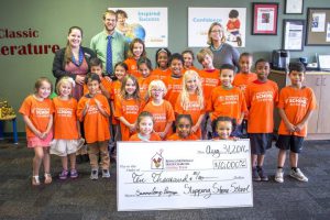 Stepping Stone school presenting 10,000$ check to Ronald McDonald House
